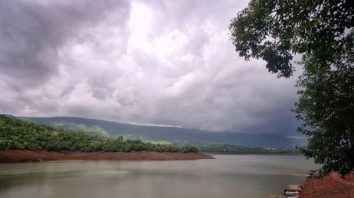 Scenic view of river against sky