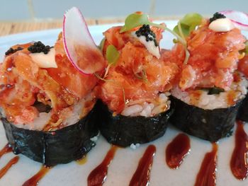 Close-up of sushi served on plate