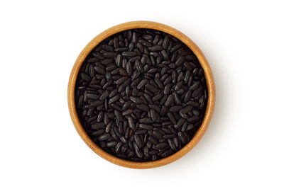 Directly above shot of coffee beans against white background