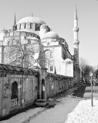 View of cathedral in city against clear sky