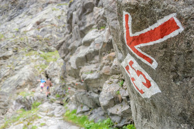 Woman standing on rock