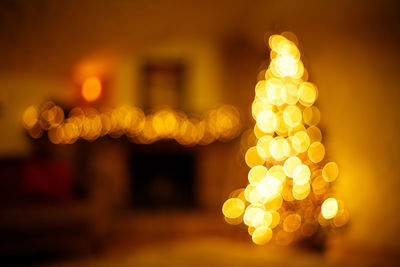 Close-up of illuminated christmas lights at night