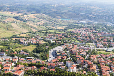 High angle view of townscape and mountains