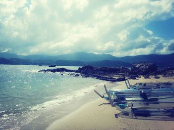 Scenic view of sea against cloudy sky