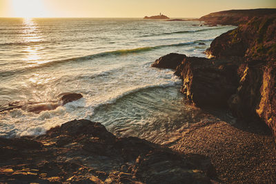 Scenic view of sea against sky during sunset