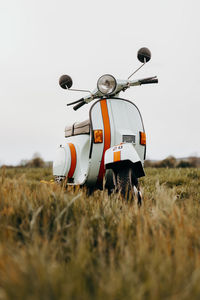 Restored old vespa in mint green and vintage style decor