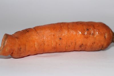 Close-up of bread against white background