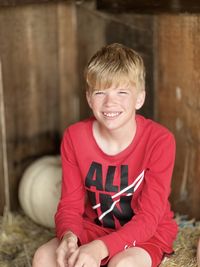 Portrait of cute baby boy sitting at home