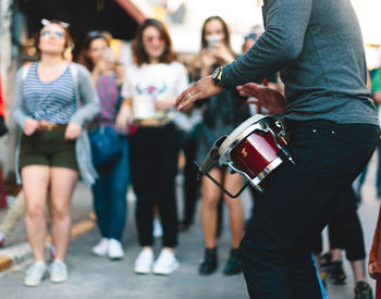 Group of people on street in city