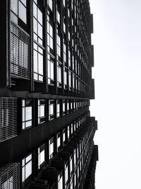 Low angle view of modern building against clear sky