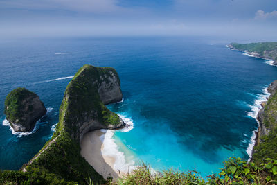 High angle view of sea shore against sky