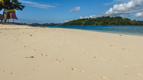 Scenic view of beach against sky