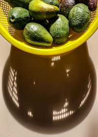 High angle view of fruits in plate on table