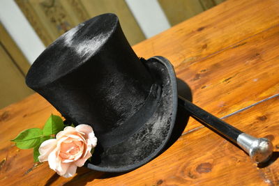 High angle view of black rose on table