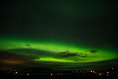 Scenic view of illuminated sky at night