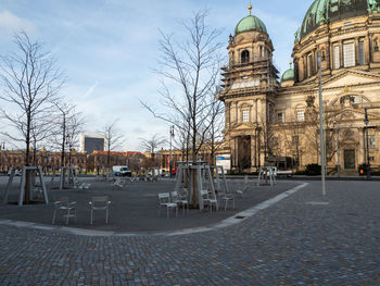 Buildings in city against sky