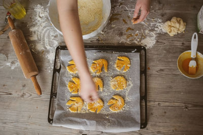 High angle view of woman preparing food