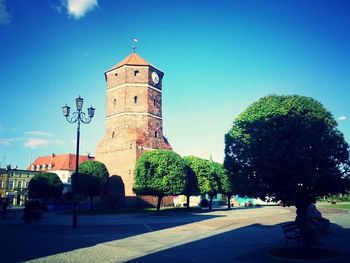 Low angle view of built structure against blue sky