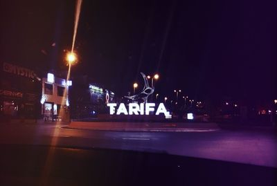 Illuminated street light at night