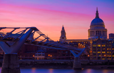 Sunset with moody sky at millennium bridge and st paul's cathedral in london