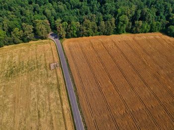 High angle view of road amidst field