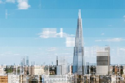 Modern cityscape against sky