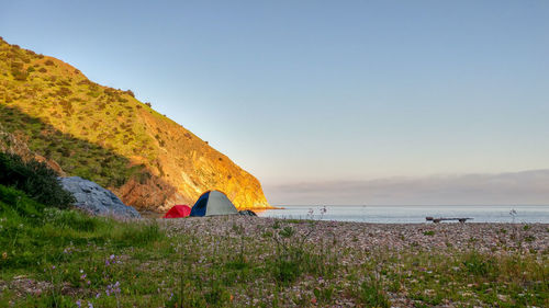 Scenic view of sea against clear sky