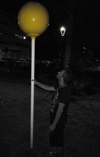 Illuminated street light at night