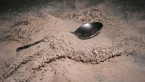 High angle view of ball on sand