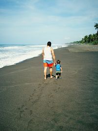 Woman standing on beach