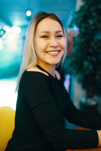 Portrait of a smiling young woman