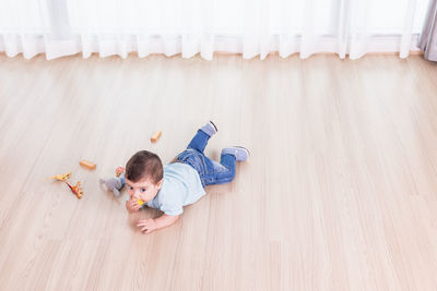 High angle view of stuffed toy on floor at home