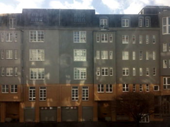 Buildings in city against sky