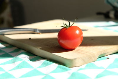 Close-up of tomatoes on wooden table