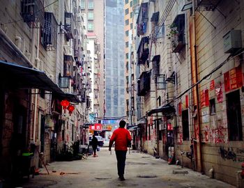 People walking on street in city