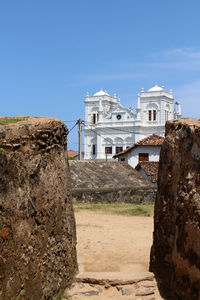 View of old building against blue sky