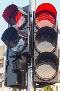 Low angle view of illuminated traffic signal
