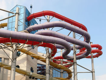 Low angle view of metallic structure against sky