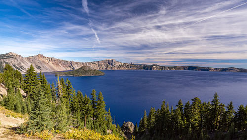 Panoramic view of bay against sky