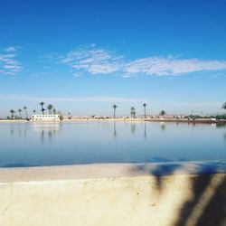 Scenic view of sea against blue sky