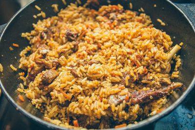 High angle view of meat in cooking pan