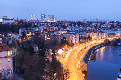 High angle view of light trails on city at night