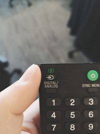 Close-up of person using mobile phone