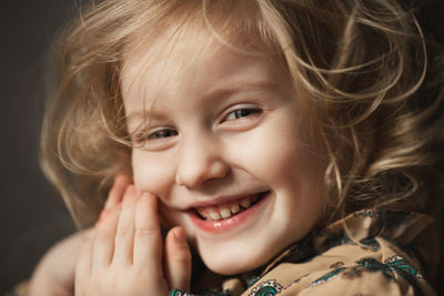 Close-up portrait of a smiling girl