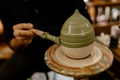 Artisan working with clay