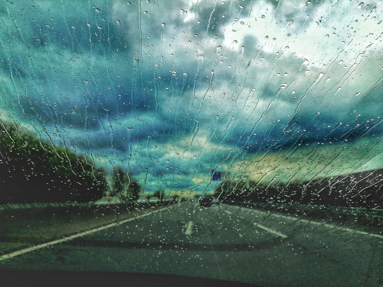 RAINDROPS ON CAR WINDOW