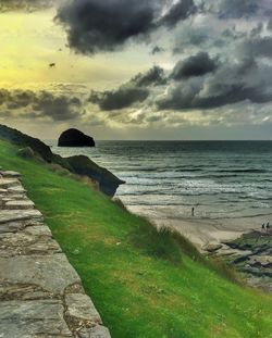 Scenic view of sea against cloudy sky