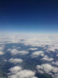 Aerial view of cloudscape against blue sky