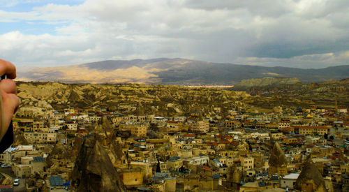 Aerial view of cityscape against sky