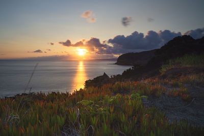 Scenic view of sea against sky during sunset